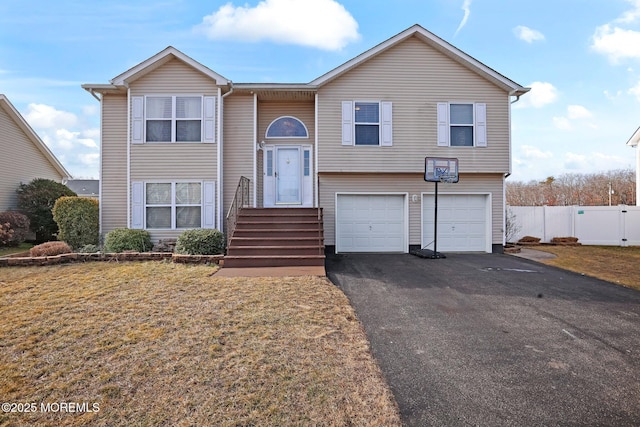 bi-level home featuring a garage