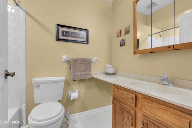 full bathroom featuring vanity, shower / washtub combination, and toilet