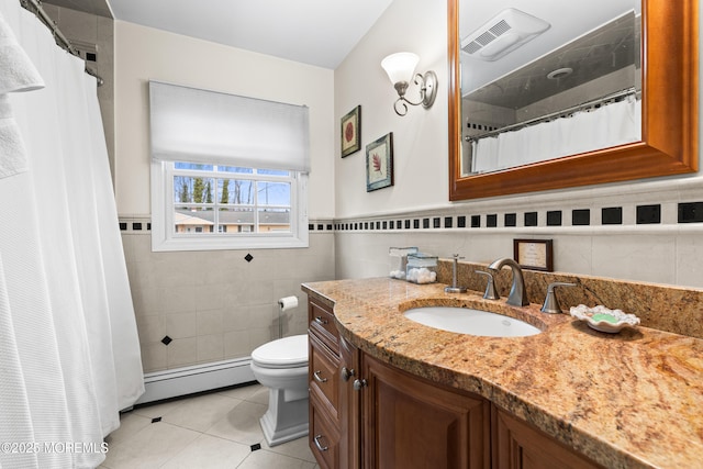 full bath with visible vents, toilet, a baseboard radiator, tile patterned flooring, and tile walls