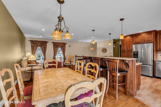 dining room featuring light hardwood / wood-style flooring