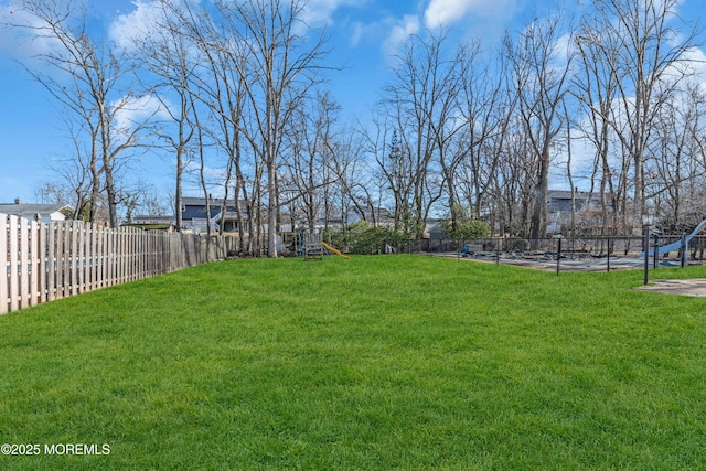 view of yard with a playground