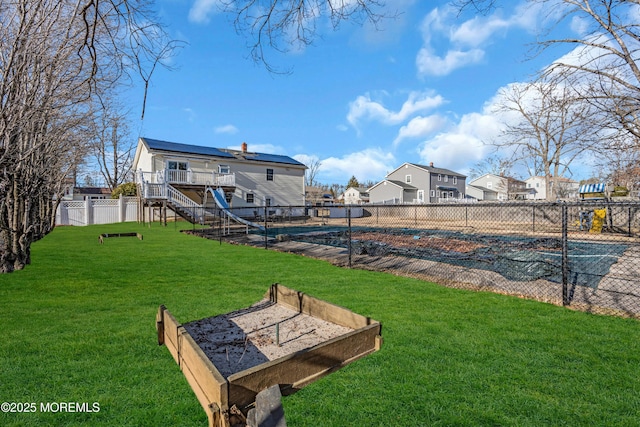 view of yard featuring a covered pool