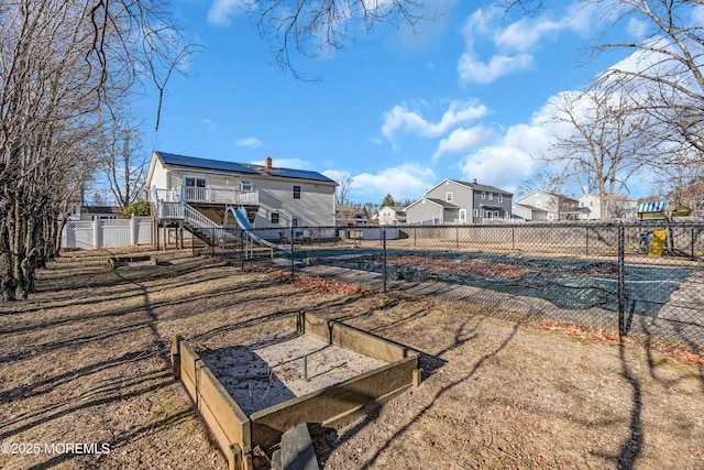 view of yard with a covered pool