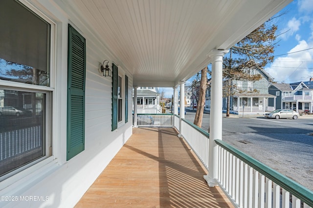 balcony featuring a porch