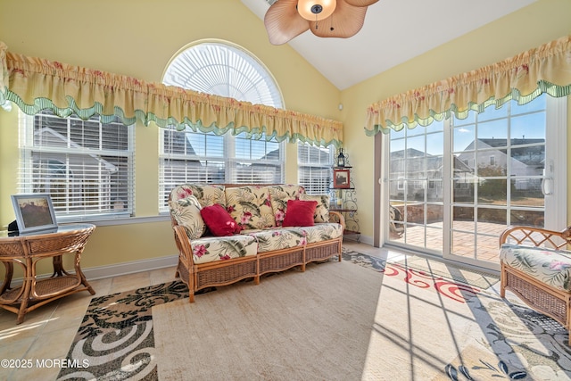 sunroom / solarium with vaulted ceiling and ceiling fan