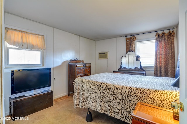 bedroom featuring an AC wall unit