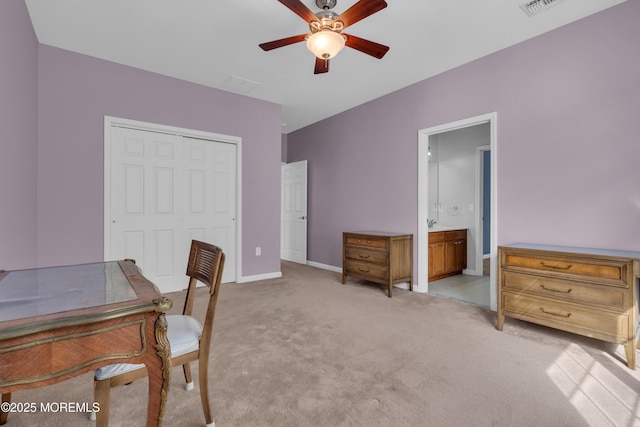 carpeted office featuring ceiling fan