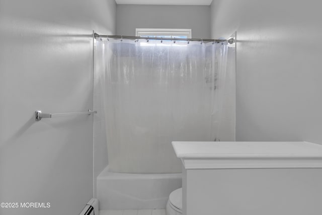 bathroom with shower / tub combo with curtain and toilet