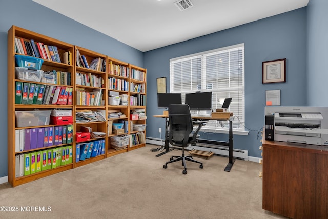 office area with carpet and baseboard heating