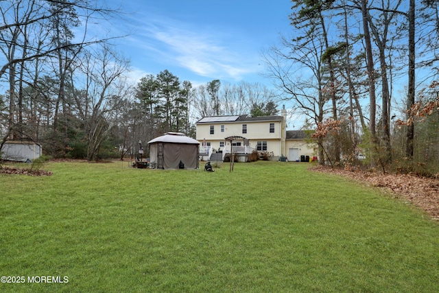 657 Toms River Rd, Jackson, NJ 08527 - back of house with a lawn