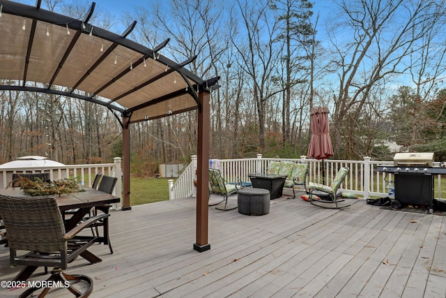657 Toms River Rd, Jackson, NJ 08527 - deck with area for grilling, outdoor dining area, and a pergola