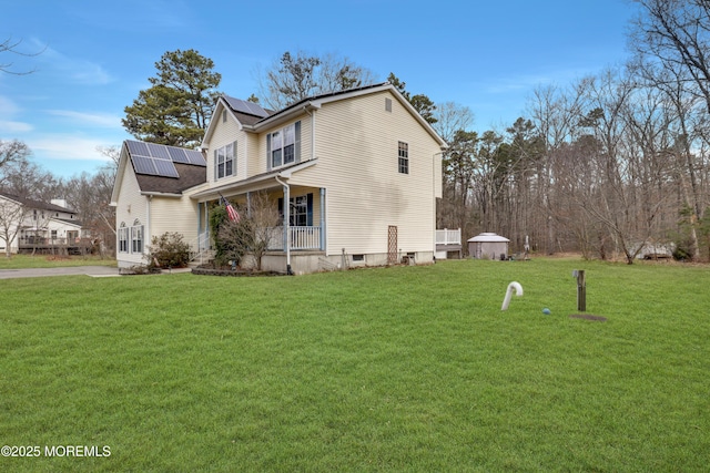 657 Toms River Rd, Jackson, NJ 08527 - view of home's exterior with covered porch, solar panels, and a lawn