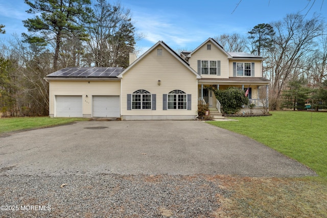 657 Toms River Rd, Jackson, NJ 08527 - traditional-style house with an attached garage, aphalt driveway, a front yard, a porch, and a chimney
