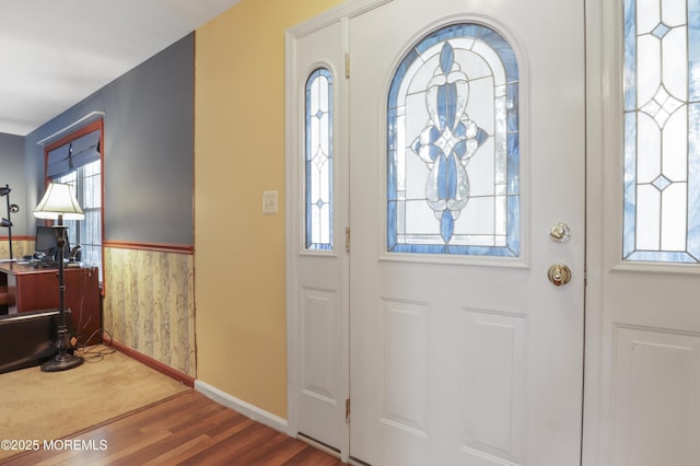 657 Toms River Rd, Jackson, NJ 08527 - entryway with a wainscoted wall, baseboards, and wood finished floors