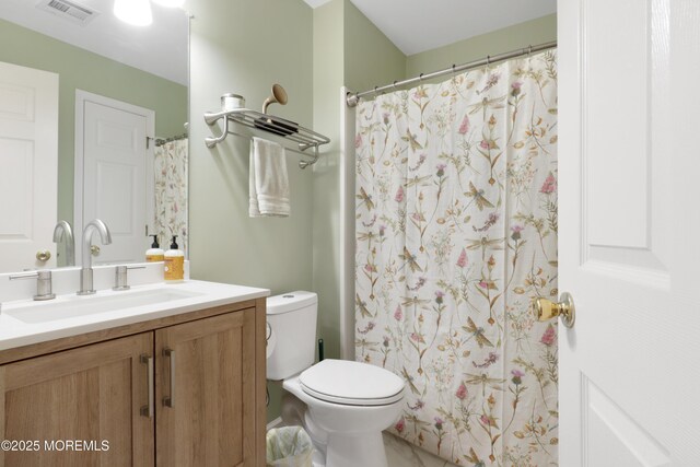 657 Toms River Rd, Jackson, NJ 08527 - full bath with a shower with curtain, toilet, vanity, and visible vents
