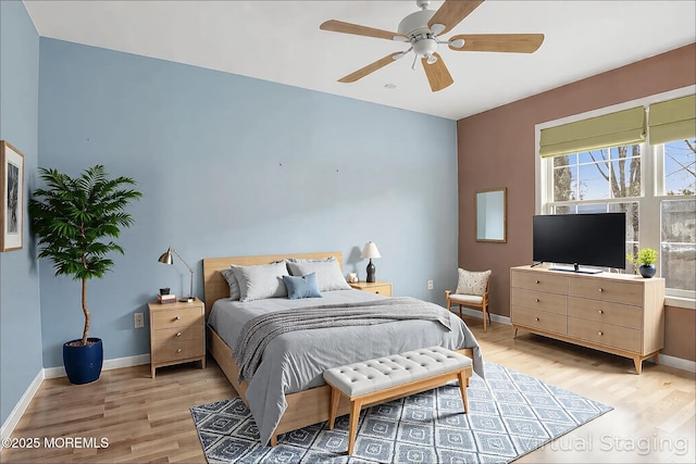 657 Toms River Rd, Jackson, NJ 08527 - bedroom with light wood finished floors, baseboards, and ceiling fan