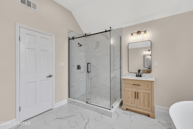 bathroom featuring vanity, an enclosed shower, and lofted ceiling