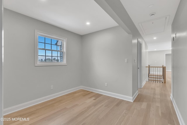 unfurnished room featuring light hardwood / wood-style flooring