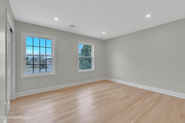 empty room featuring light hardwood / wood-style floors