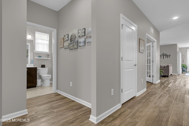 hall featuring light wood-type flooring