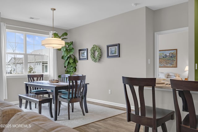 dining room featuring light hardwood / wood-style floors