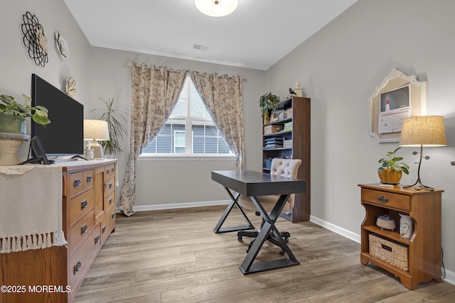 office featuring light hardwood / wood-style floors