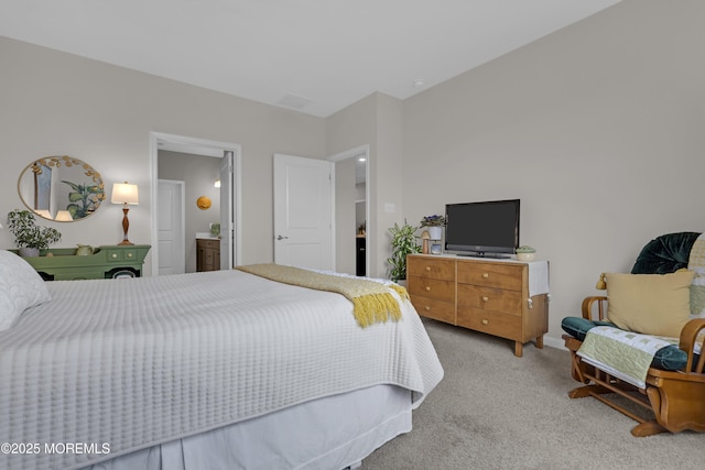 bedroom featuring light colored carpet