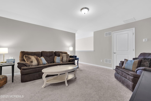 living room featuring light colored carpet