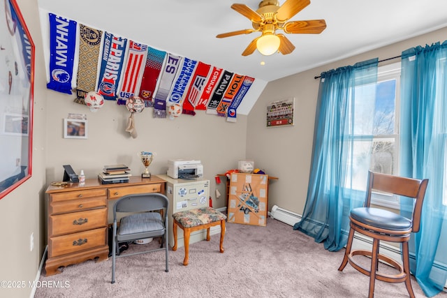 carpeted home office featuring lofted ceiling, a baseboard radiator, and ceiling fan