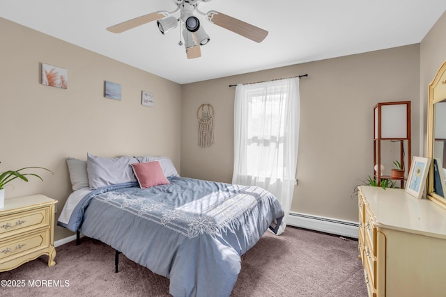 bedroom with a baseboard radiator, ceiling fan, and dark carpet