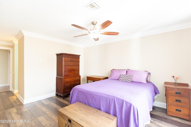 bedroom featuring crown molding, ceiling fan, and dark hardwood / wood-style flooring