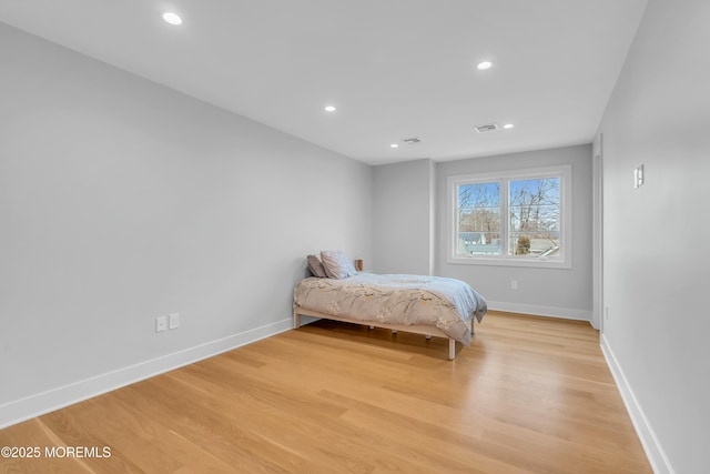 unfurnished bedroom featuring light hardwood / wood-style floors