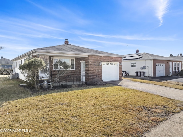 single story home featuring a garage and a front yard