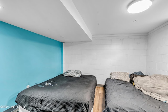 bedroom featuring hardwood / wood-style floors