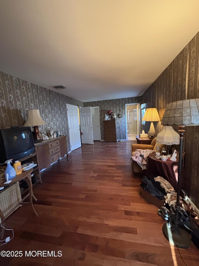 living room with dark hardwood / wood-style flooring