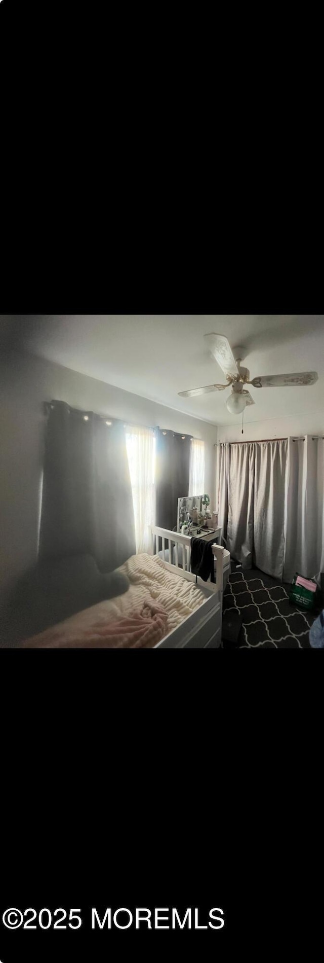 unfurnished bedroom with a ceiling fan