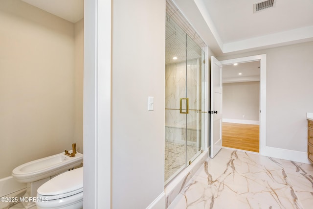 bathroom with toilet, visible vents, baseboards, marble finish floor, and a bidet