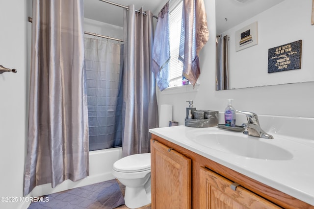 full bathroom featuring shower / bathtub combination with curtain, vanity, toilet, and tile patterned floors