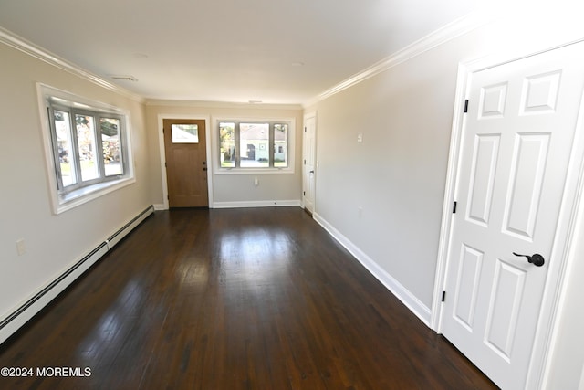 foyer featuring dark wood-type flooring, crown molding, and a baseboard heating unit