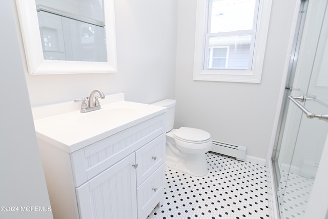 bathroom featuring vanity, baseboard heating, and walk in shower