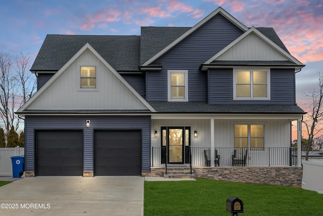 craftsman-style home with a lawn and a porch