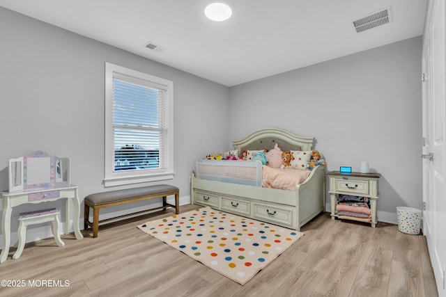 bedroom featuring light hardwood / wood-style flooring