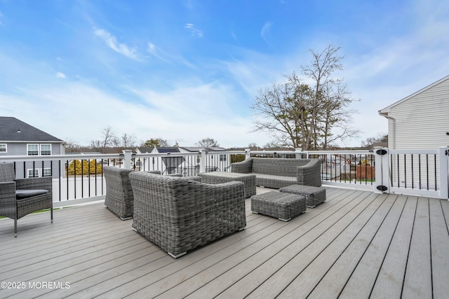 wooden terrace featuring an outdoor hangout area