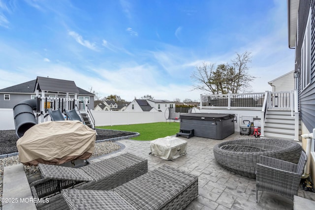 view of patio / terrace featuring a hot tub