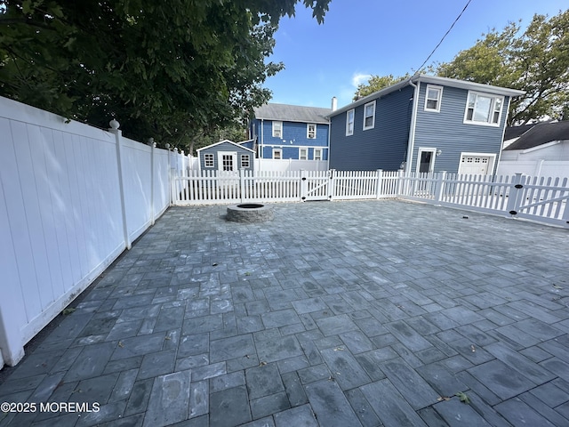 view of patio / terrace featuring a garage