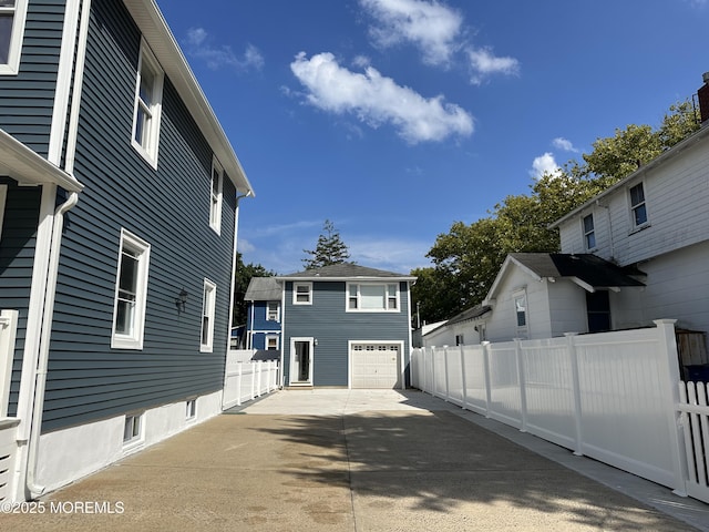 exterior space with a garage