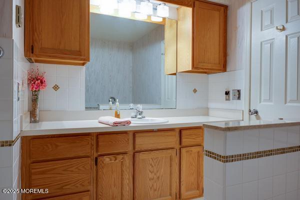 kitchen with sink and backsplash