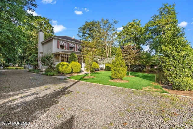 view of front of home with a front yard