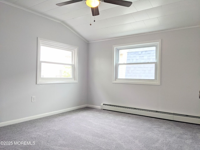 carpeted spare room with crown molding, a baseboard radiator, lofted ceiling, and ceiling fan