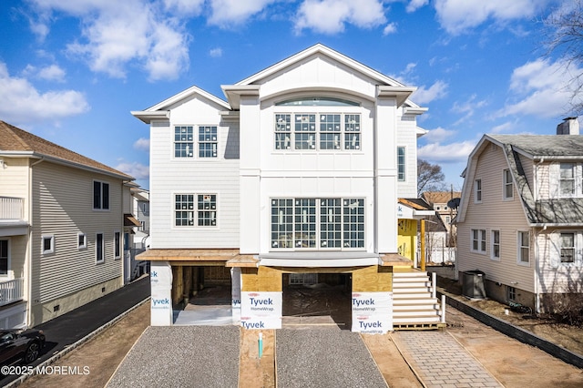 view of front facade with board and batten siding